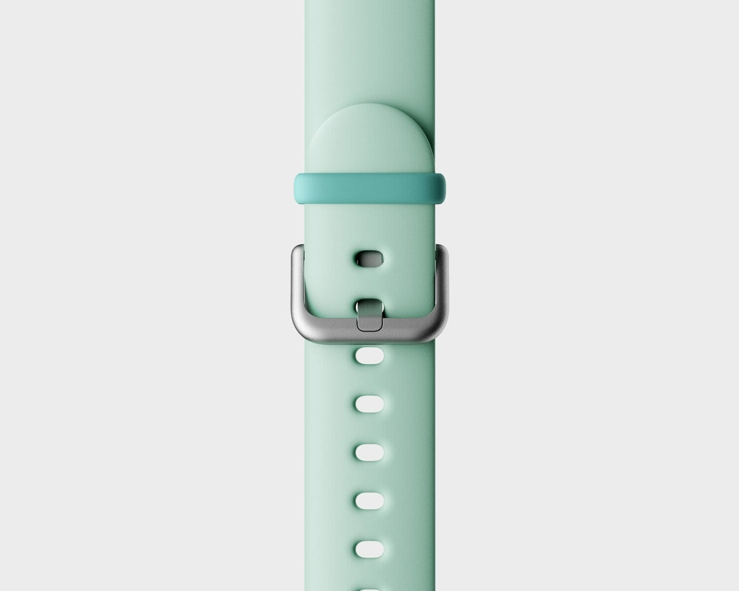 Verizon Ggzmo smartwatch mint silicone strap with adjustable buckle and multiple sizing holes.